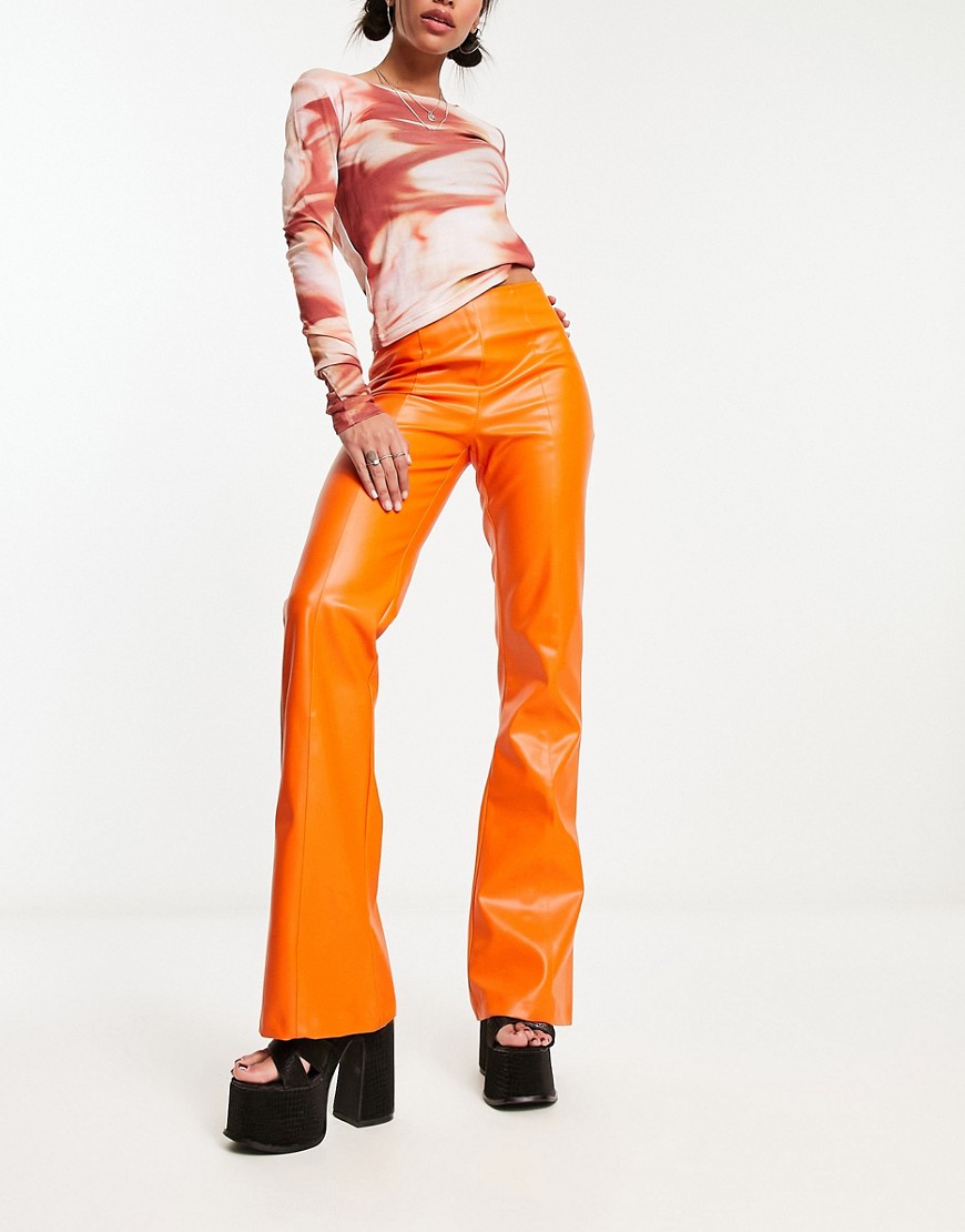 Heartbreak faux leather wide leg trousers co-ord in orange