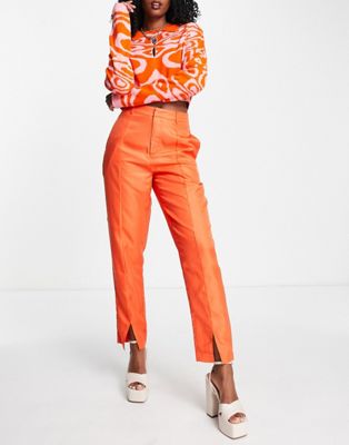 Heartbreak pin tuck tailored trousers with front split co-ord in orange