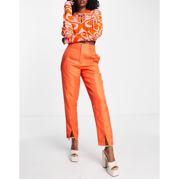 Heartbreak pin tuck tailored trousers with front split co-ord in orange 