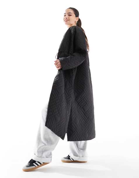 Hera Womens longline puffer jacket in black - view 1