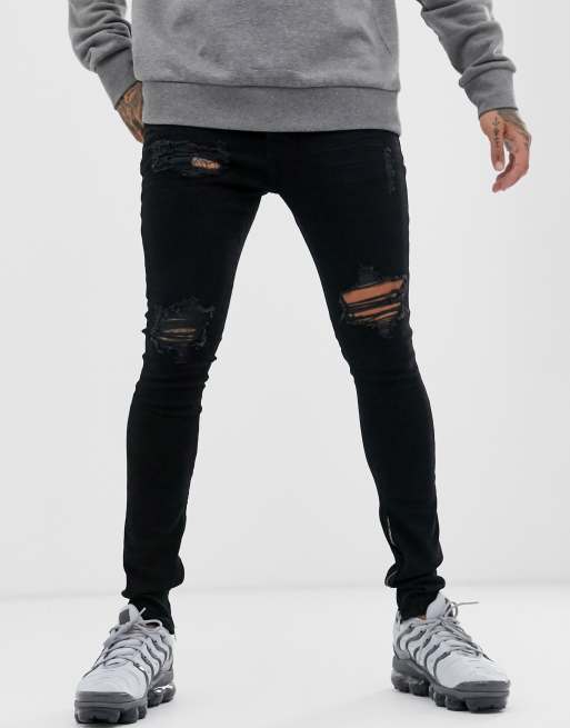 Hermano rip and repair skinny jeans in black | ASOS