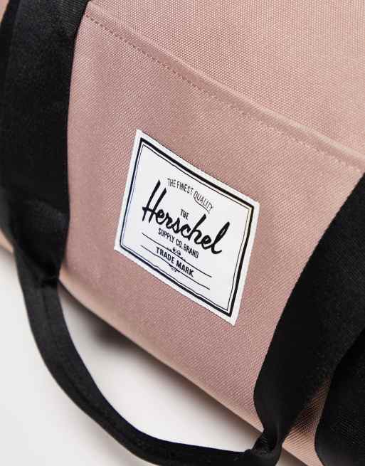 Pink herschel clearance duffle bag