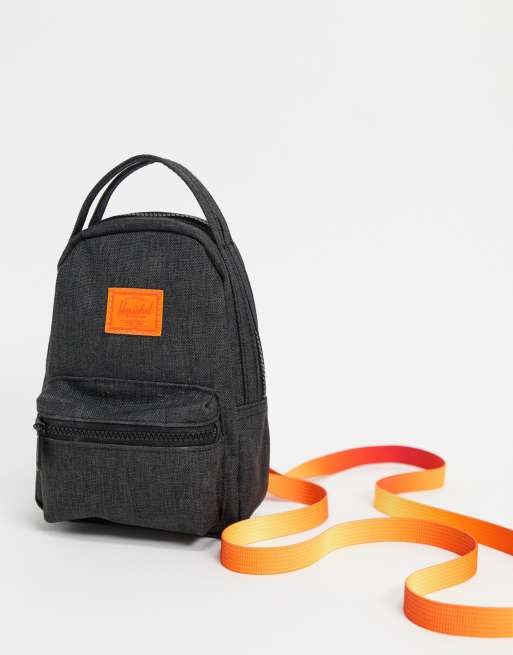 Herschel Nova crossbody mini backpack in black, ASOS