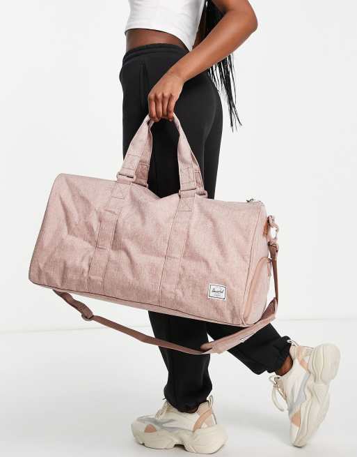 Herschel Supply Co. novel mid volume duffle bag in ash rose cross