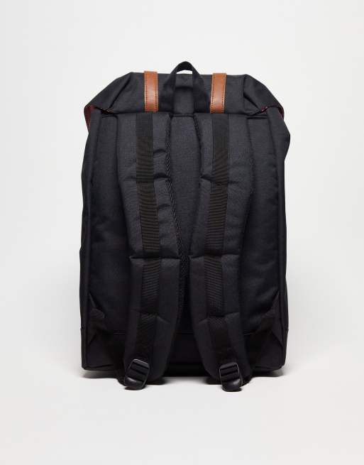 Herschel supply co retreat backpack 2025 in black with rubberised straps