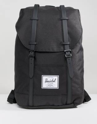 herschel supply co retreat backpack in black with rubberised straps