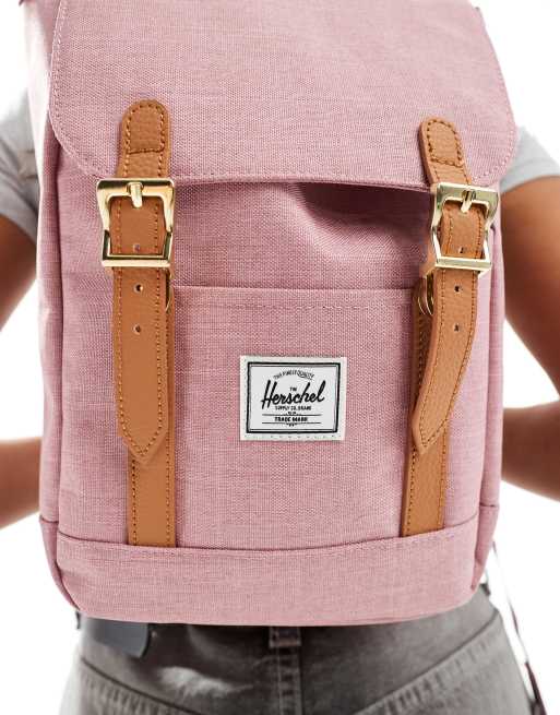 Herschel Supply Co retreat mini backpack in pink with tan straps | ASOS