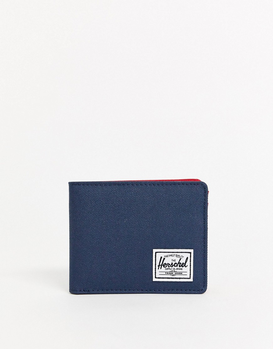 Herschel Supply Co - Roy - Portafoglio a libro blu navy con protezione da RFID