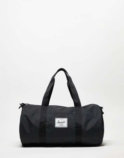 Herschel Supply Co – Svart, klassisk duffelbag för gymmet