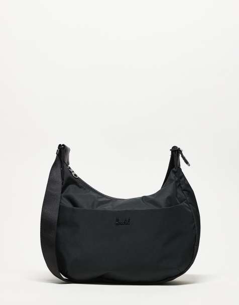 Herschel Supply Co - Yara - Sort crossbody-taske i slyngestil - view 1