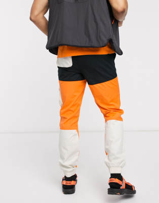 black and orange cargo pants