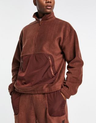 HIIT 1/4 zip in fleece with woven panels