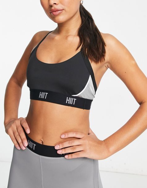 Nike Training Plus High Shine Indy light support sports bra in pink