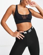 ASOS 4505 medium support sports bra with removable padding in leopard print