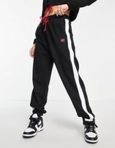 Topshop sporty shell cuffed tracksuit bottoms in burgundy - part of a set