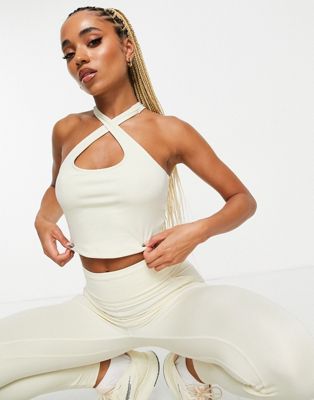 HIIT crop vest with twist back in stone - ASOS Price Checker