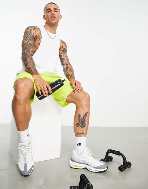 HIIT drop armhole singlet in white with contrast logo