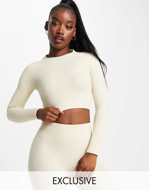 HIIT – Gräddvit ribbad crop top i seamless modell med lång ärm