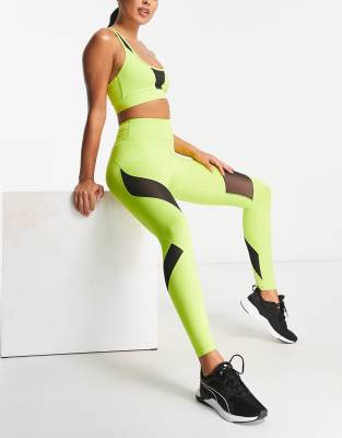 HIIT - Leggings in Neonfarbe mit Netzstoff-Zierausschnitten-Schwarz