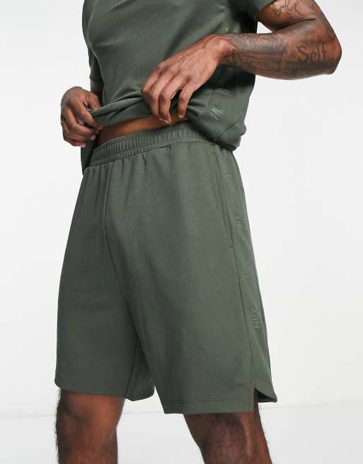 HIIT - Longline vævede shorts 