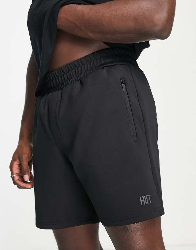 HIIT mid length short in tricot in black