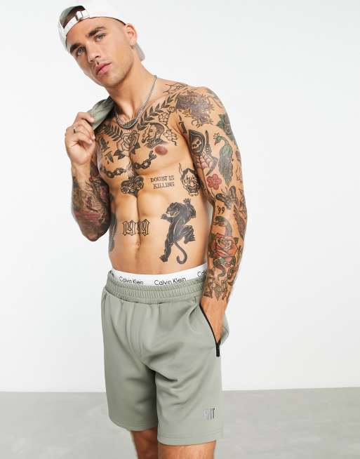 HIIT mid length short in tricot in khaki