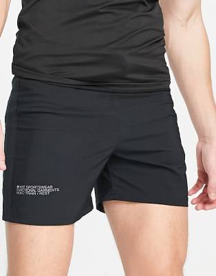 HIIT - Mittellange Shorts aus Webstoff in Schwarz