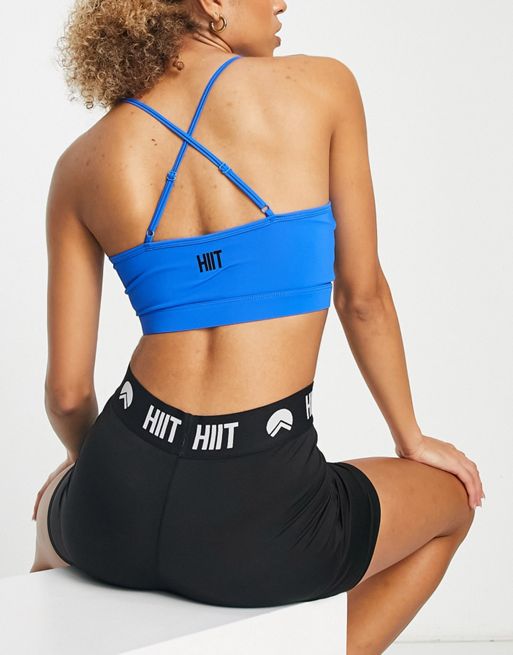 HIIT crop sports bra with cut out in holographic print
