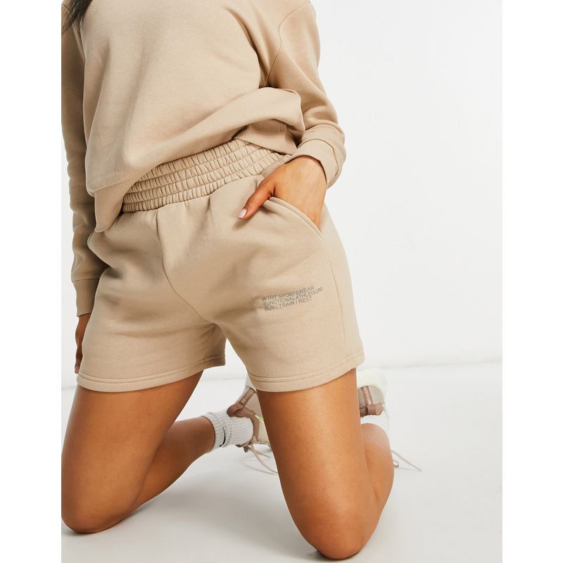 Activewear Donna HIIT - Pantaloncini con logo marrone chiaro