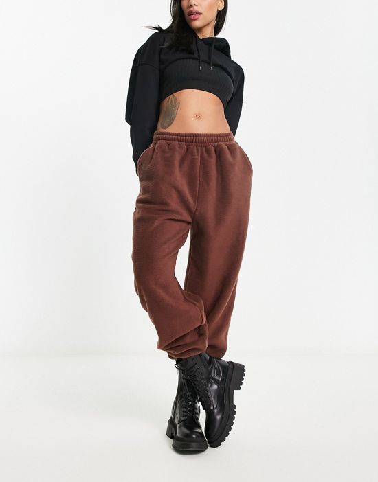 https://images.asos-media.com/products/hiit-relaxed-fit-sweatpants-in-borg-in-brown/203018959-1-caramel?$n_550w$&wid=550&fit=constrain