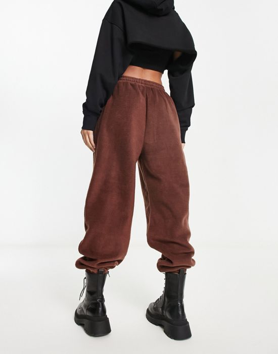 https://images.asos-media.com/products/hiit-relaxed-fit-sweatpants-in-borg-in-brown/203018959-2?$n_550w$&wid=550&fit=constrain