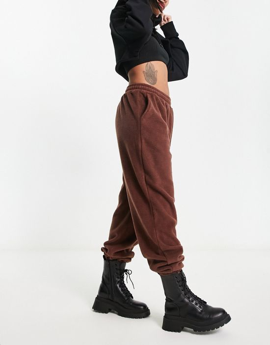 https://images.asos-media.com/products/hiit-relaxed-fit-sweatpants-in-borg-in-brown/203018959-4?$n_550w$&wid=550&fit=constrain