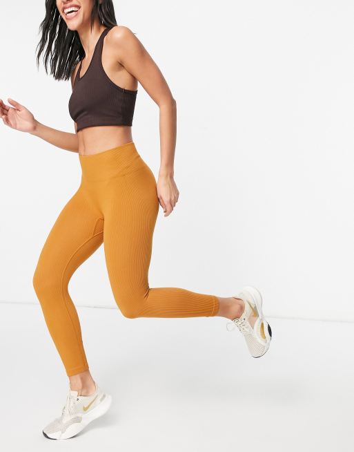 HIIT ribbed seamless leggings in gold, Compare