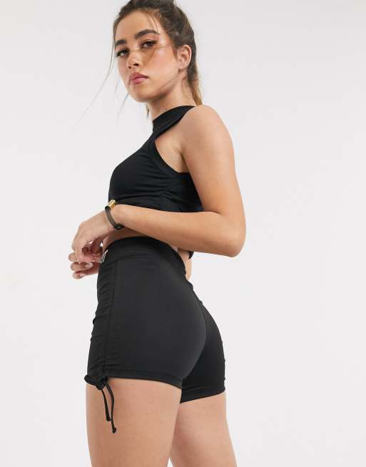 HIIT ruched booty shorts in black