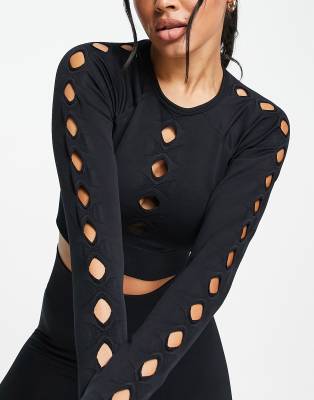 seamless crop top with cut outs in black