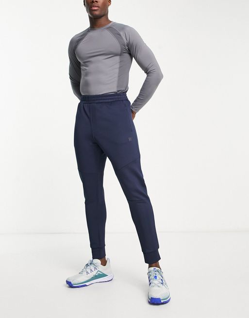 HIIT - Slim-fit joggingbroek van tricot in marineblauw