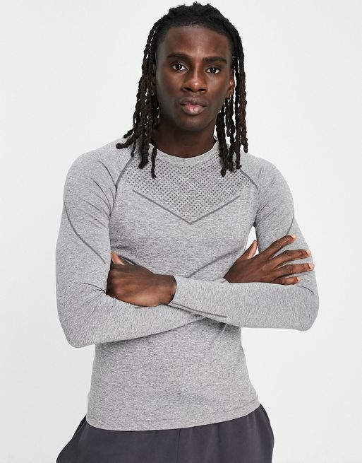 HIIT - Sømløs, tætsiddende T-shirt med lange ærmer og konturdetaljer i grå