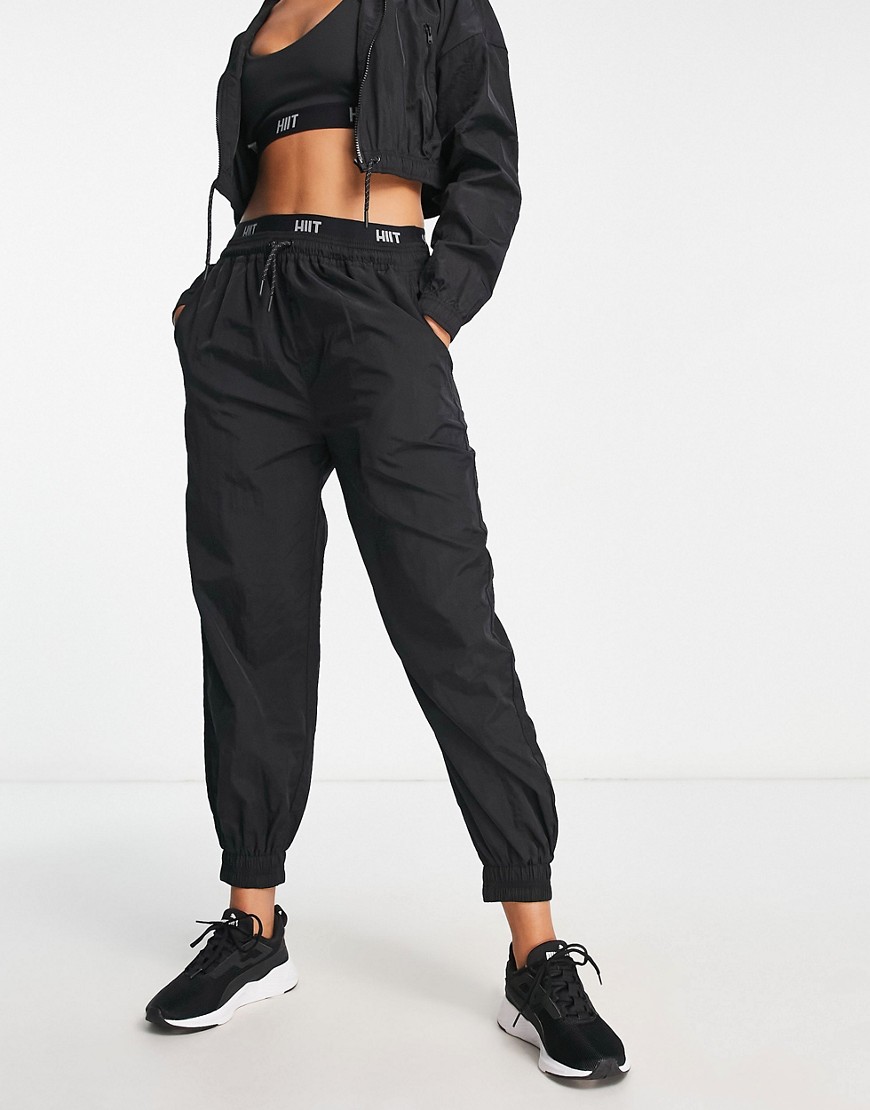 HIIT sweatpants with logo print-Black