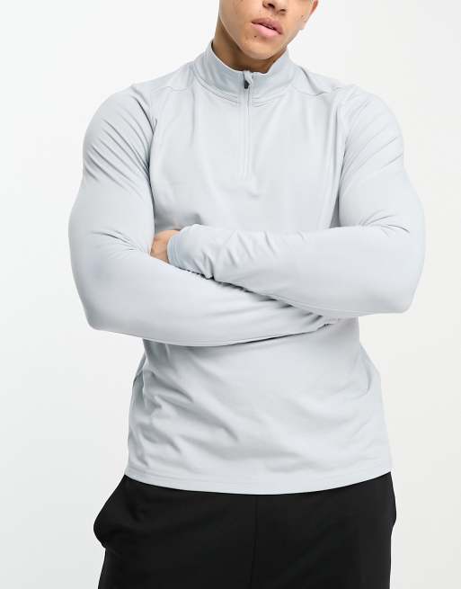 HIIT - Top met 3/4 rits en lange mouwen in lichtblauw