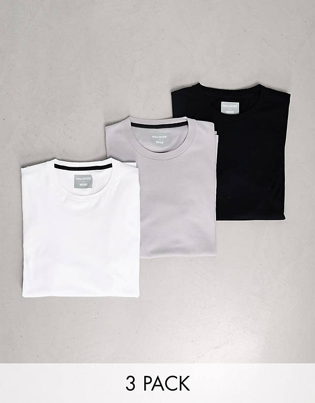 Hollister - 3 pack slim fit crew neck small logo t-shirt in white/grey/navy