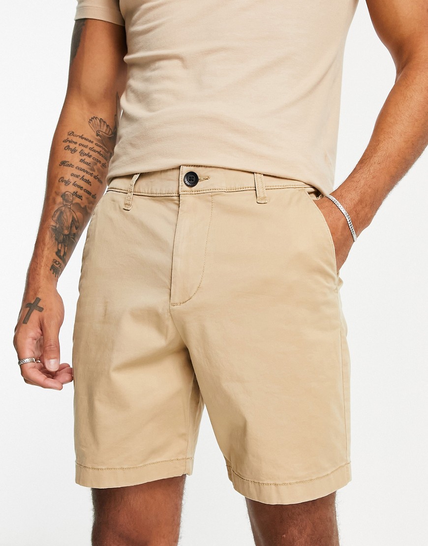 Hollister 7in flat front chino shorts in light khaki beige-Neutral