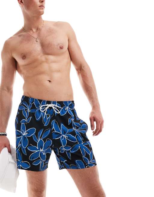 Hollister 9inch floral print swim shorts in black and blue with side pockets