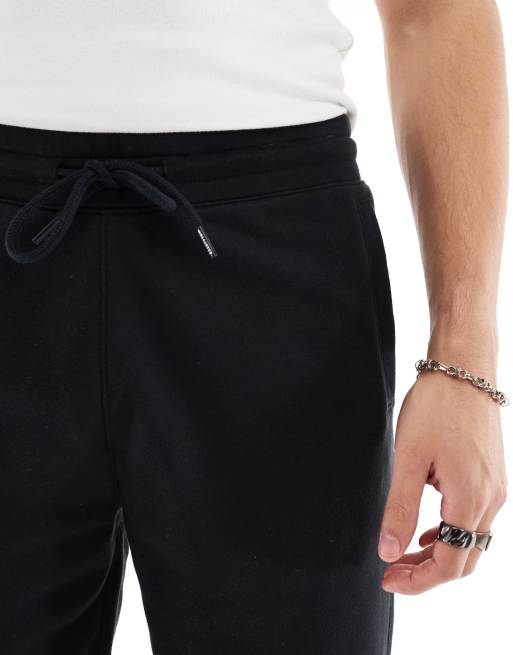 Hollister 9inch tech logo sweat shorts in black ASOS