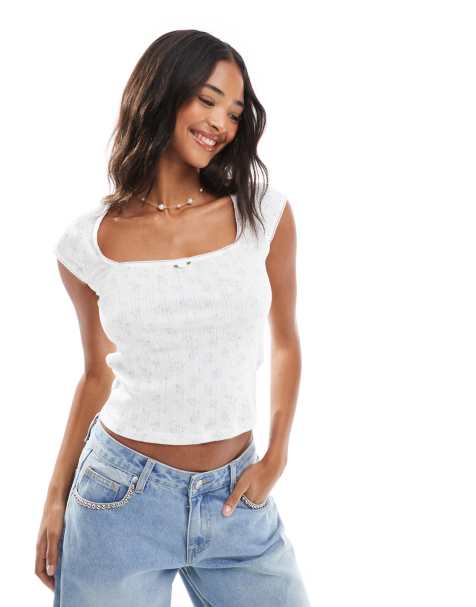 Hollister - Ajourgebreide top met korte mouwen in wit met bloemenprint - view 1