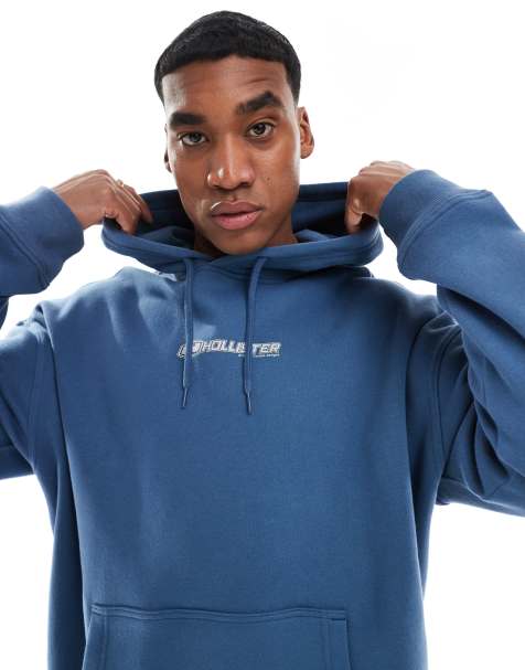 Hollister - Baggy sweatertop met jaren 90-motief op de achterkant in blauw - view 1