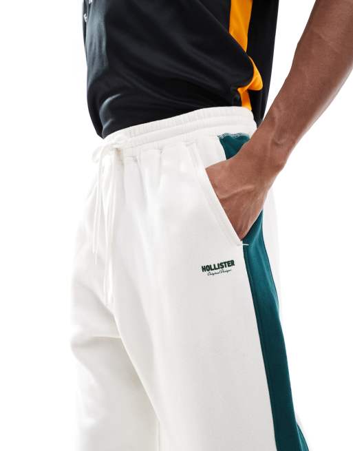 Hollister baggy varsity side stripe trackies in cream, 3 of 5