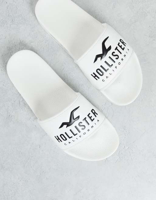 Hollister – Białe klapki z logo – tylko w ASOS