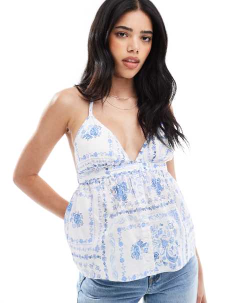 Hollister halterneck open back sleeveless top in white and blue florals