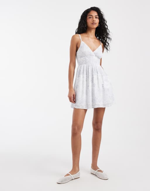 Hollister - Blå minikjole med V-hals, stropper og blomstermønster, 3 af 4