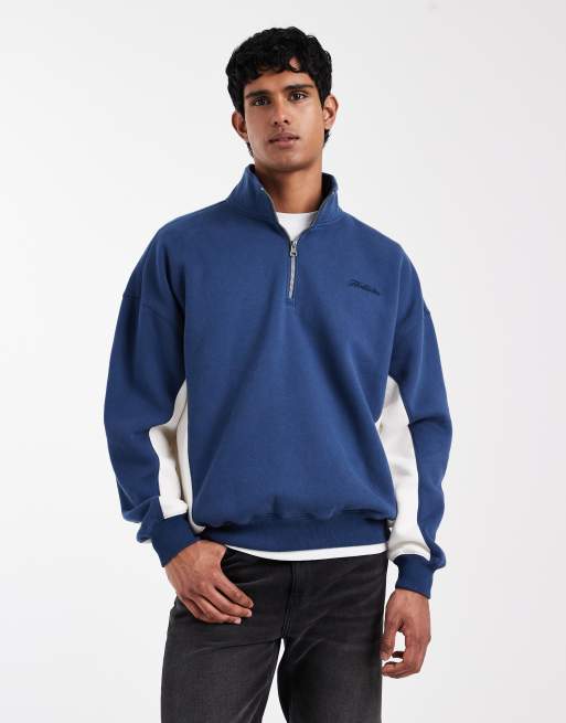 Hollister – Blå sweatshirt med kvartslång dragkedja och logga på bröstet